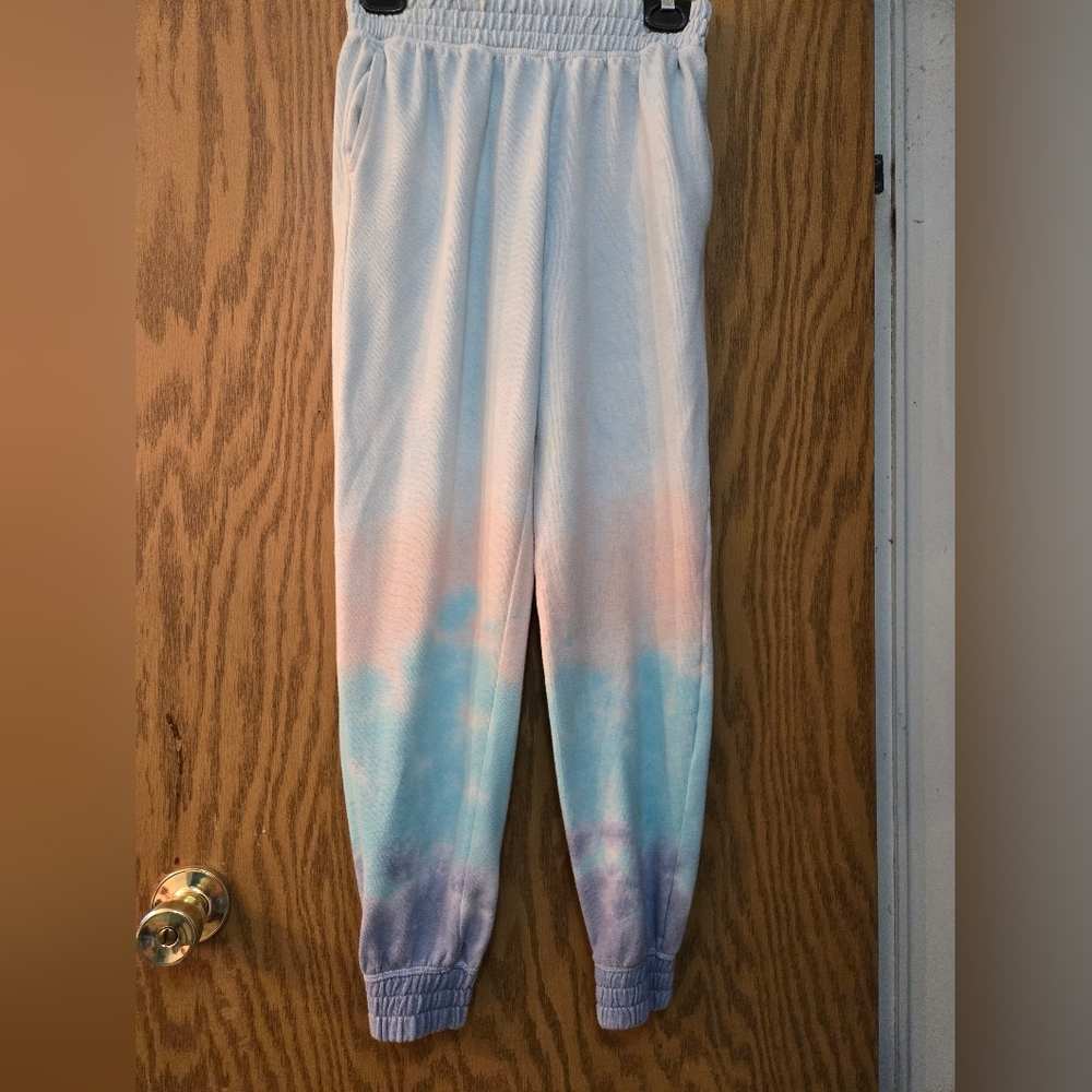 Very cute, soft, light purple, blue, and peach joggers with pockets.